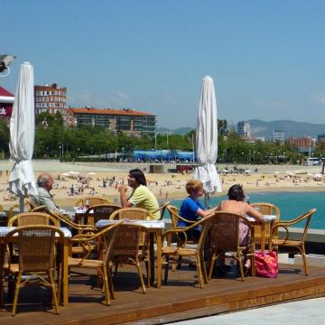 Nova Icària Beach People in café terraces and on the seafront promenade